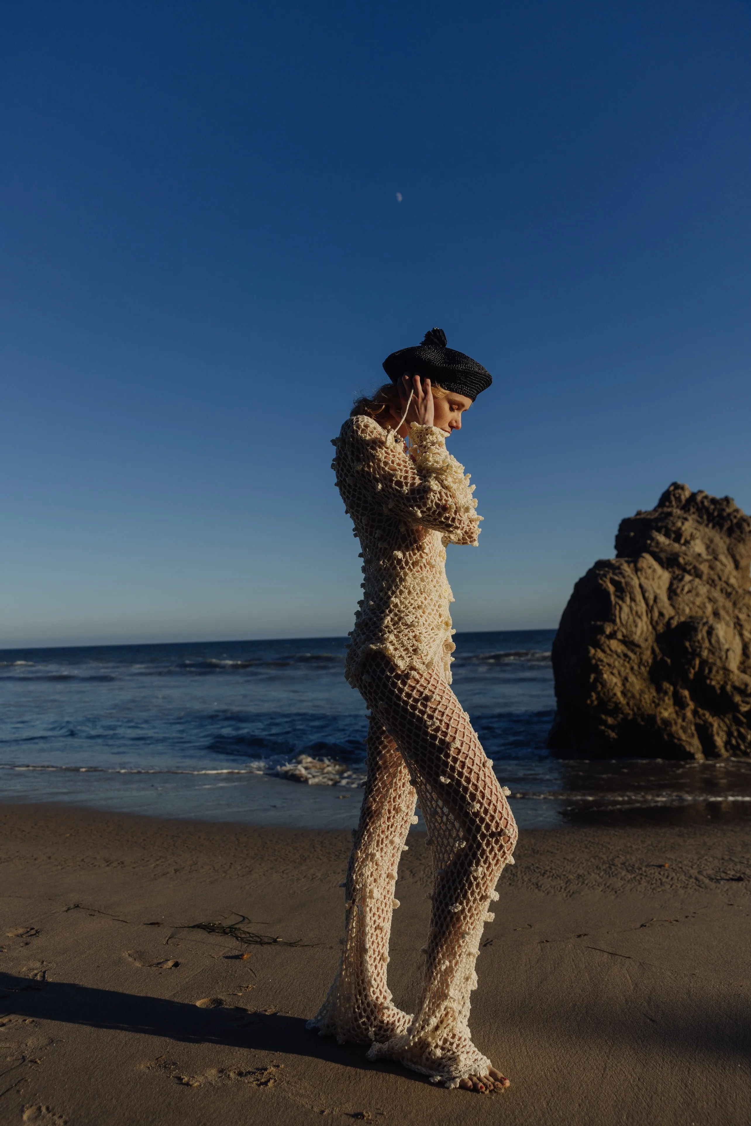 Beige raffia beret hat by Aliya Zhamantayeva