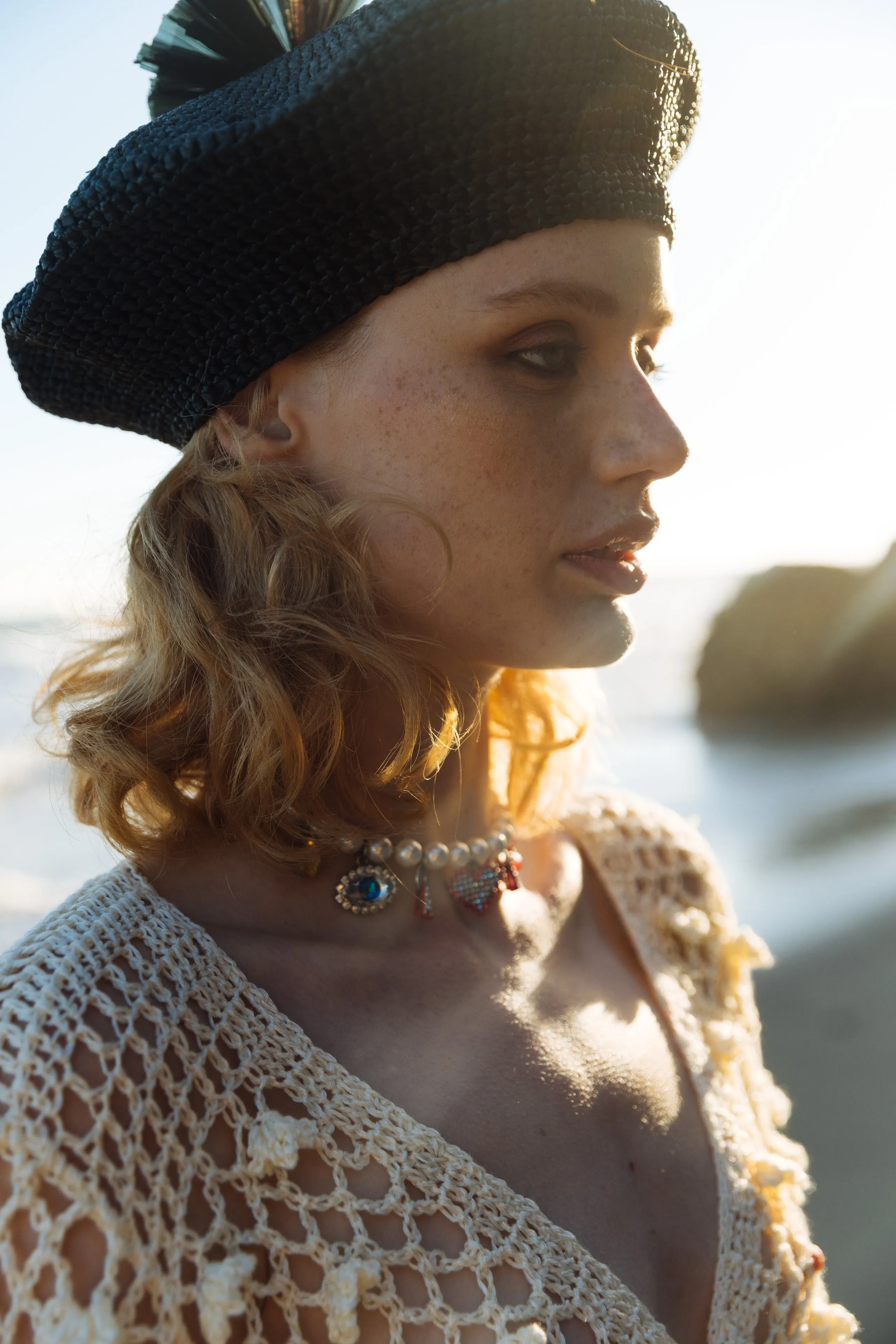 Beige raffia beret hat by Aliya Zhamantayeva